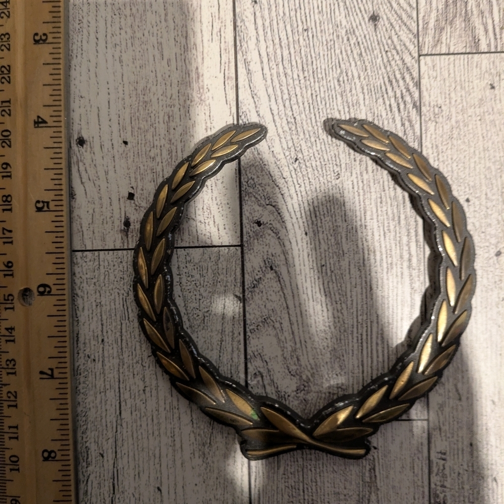 Cadillac Elegant Gold Wreath Emblem